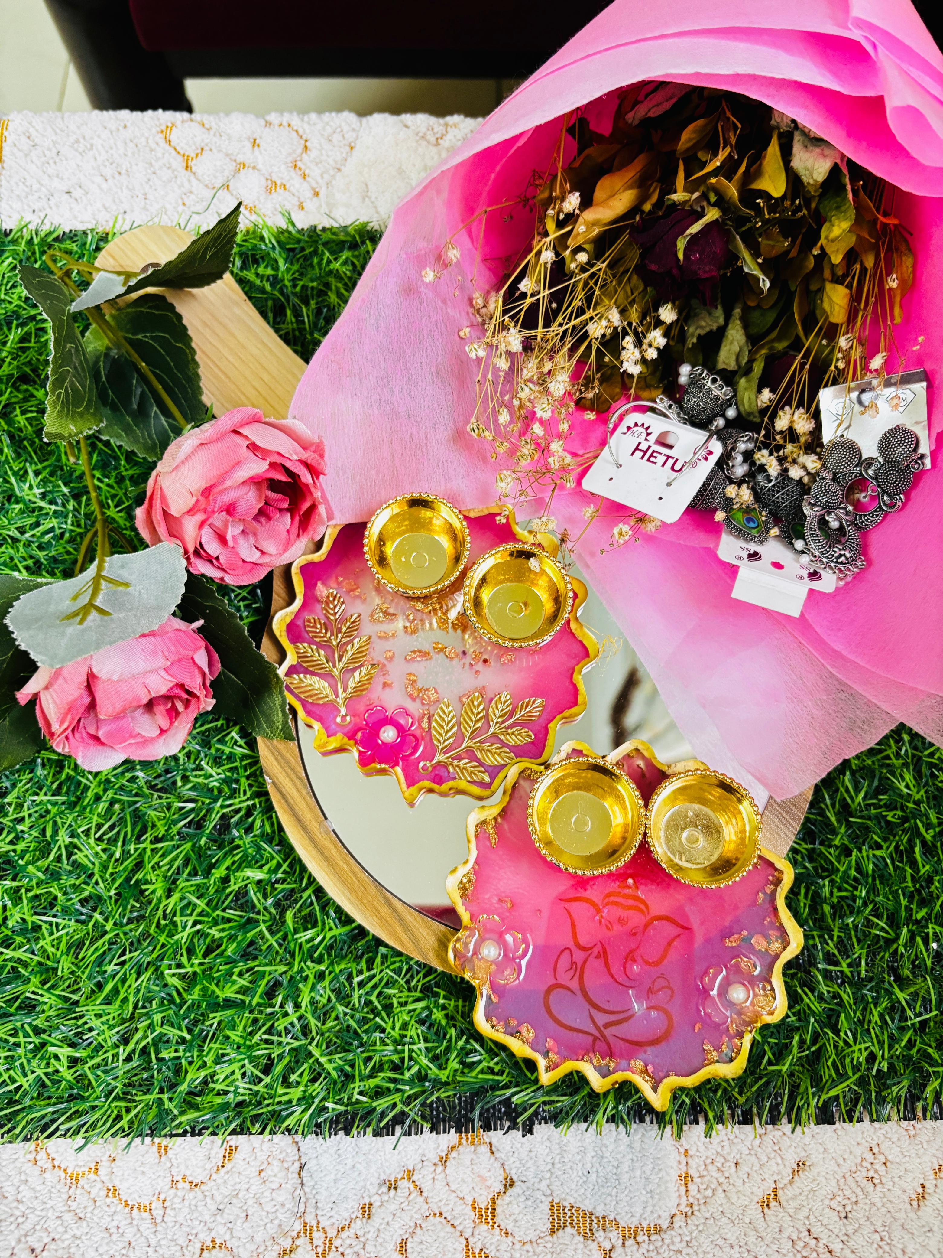 Luxury resin diya gift hamper with dried flower bouquet and earrings